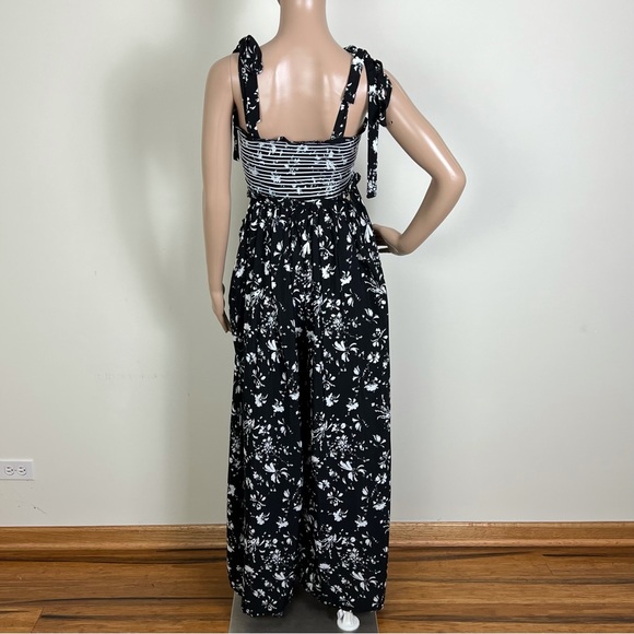 FREE PEOPLE REVOLVE BLACK FLORAL PRINT WIDE-LEG JUMPSUIT - Picture 10 of 11